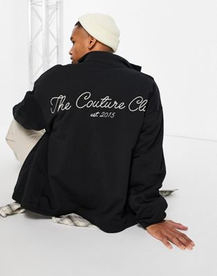 The Couture Club zip through jacket in black with back logo print and rubber badge