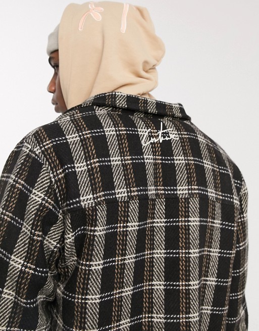 The Couture Club zipped front checked overshirt in black check