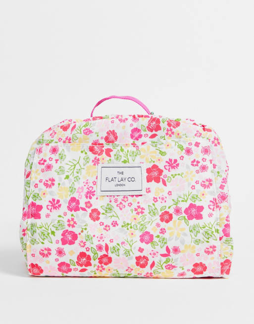 The Flat Lay Co. Drawstring Bag in Pink Ditsy Print