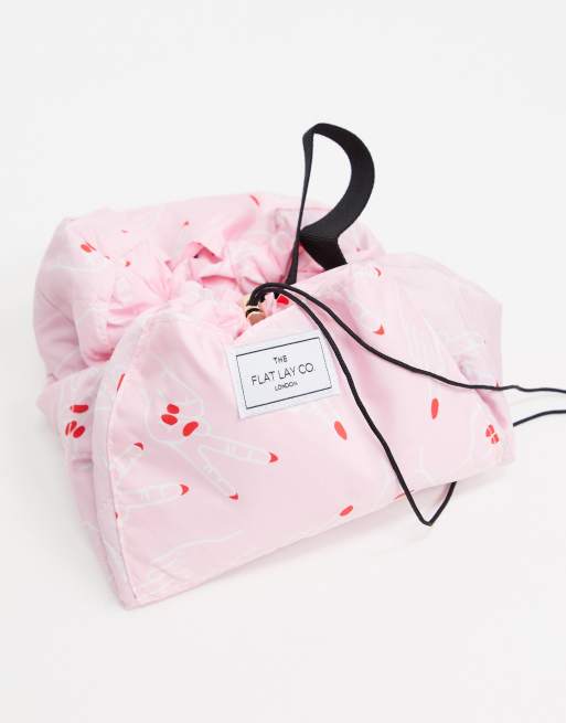 The Flat Lay Co. - Make-up tas met trekkoord en print met vingers