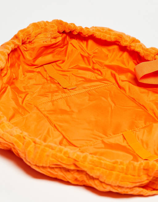 The Flat Lay Co. X ASOS EXCLUSIVE Drawstring Bag - Orange Towel | ASOS