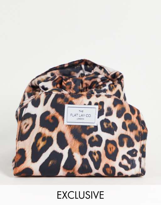 The Flat Lay Co. x ASOS Exclusive Drawstring Makeup Bag Warped Leopard Print