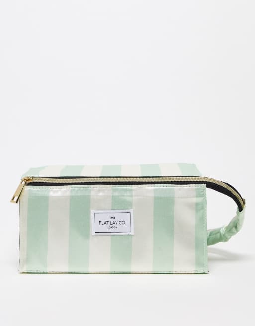 Flat lay discount makeup bag asos