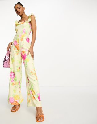 The Frolic - Bunter Jumpsuit mit buntem Blütenmuster, Rüschen und weitem Bein