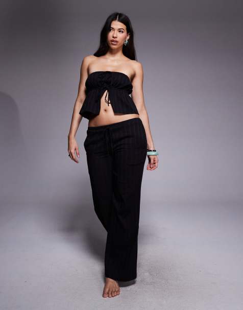 The Frolic cotton rich cheesecloth broderie tie waist wide leg beach trousers co-ord in black - view 1