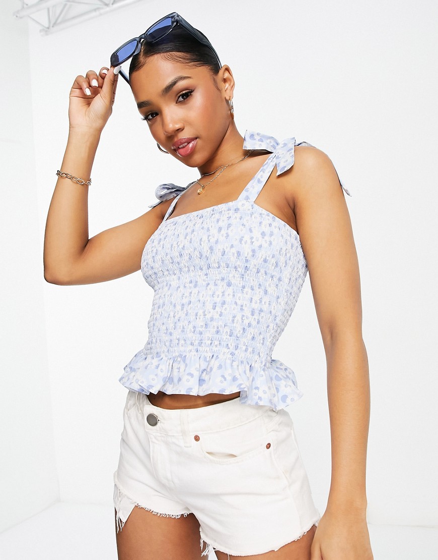 The Frolic ditsy shirred tie-detail top in pale blue