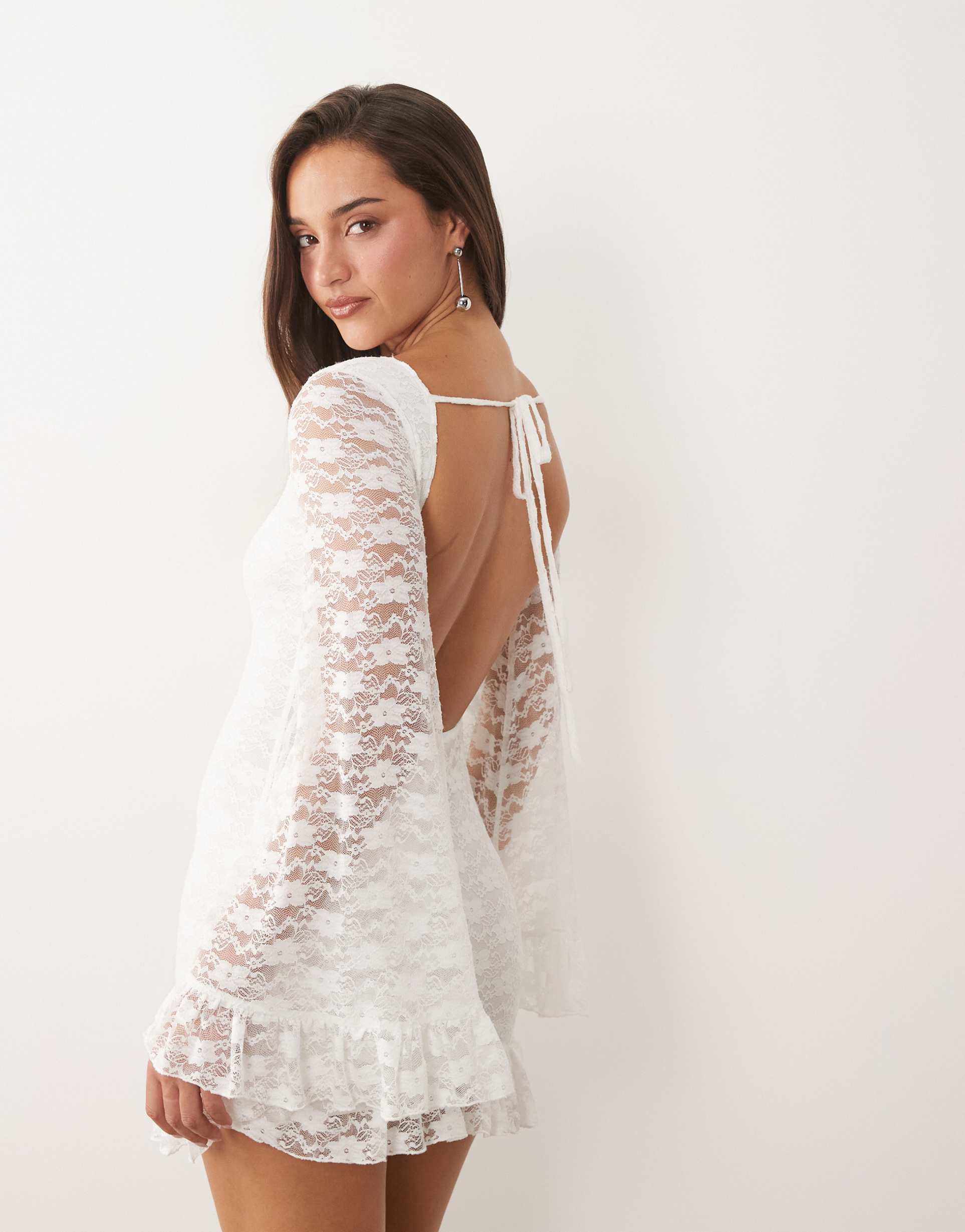 the frolic exclusive boat neck open back frill sleeve & hem mini dress in white