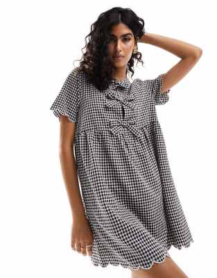 exclusive bow detail smock dress in black and white gingham