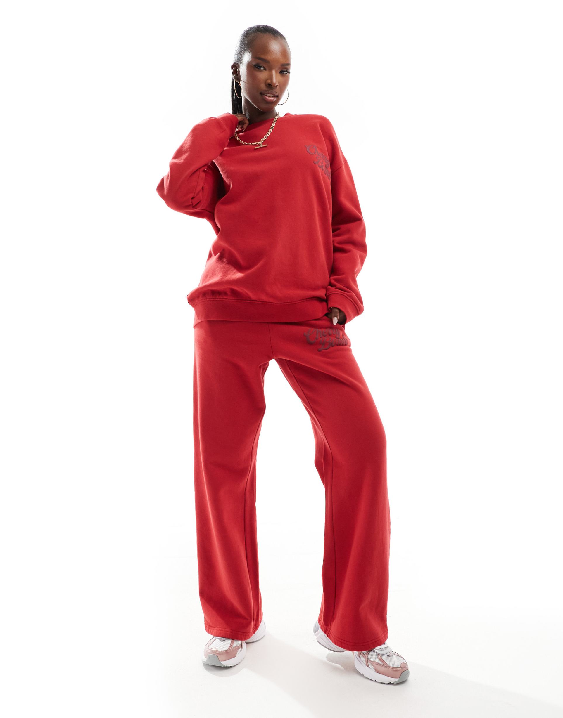 the frolic exclusive cherry bomb wide leg sweatpants in red - part of a set