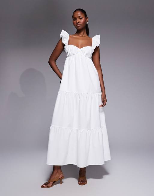 The Frolic exclusive cotton blend frill detail tie back tiered maxi dress  in white | ASOS