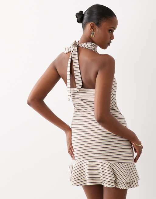 The Frolic exclusive cotton rich cowl halterneck ruffle hem mini dress in  cream multi stripes | ASOS