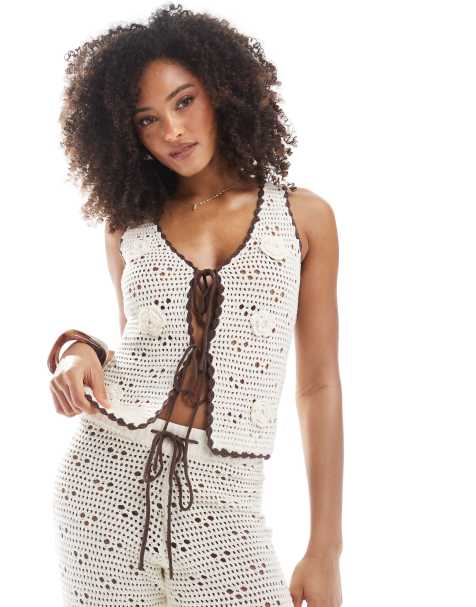 The Frolic exclusive crochet knitted contrast trim tie front beach waistcoat top co-ord in cream  