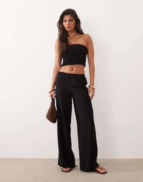 The Frolic Exclusive – Czarny marszczony zestaw: top bandeau i spodnie z szerokimi nogawkami - view 1