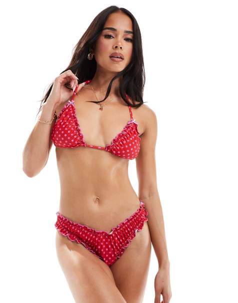 The Frolic Exclusive – Czerwona góra od bikini z dekoltem halter, kontrastowym karbowanym wykończeniem i wzorem w różowe groszki, część zestawu - view 1