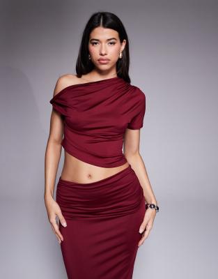 The Frolic The Frolic exclusive double sculpted slinky off shoulder twist detail asymmetric crop top co-ord in burgundy-Red