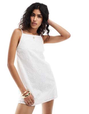 exclusive jewel eyelet high neck line strappy mini beach dress in white