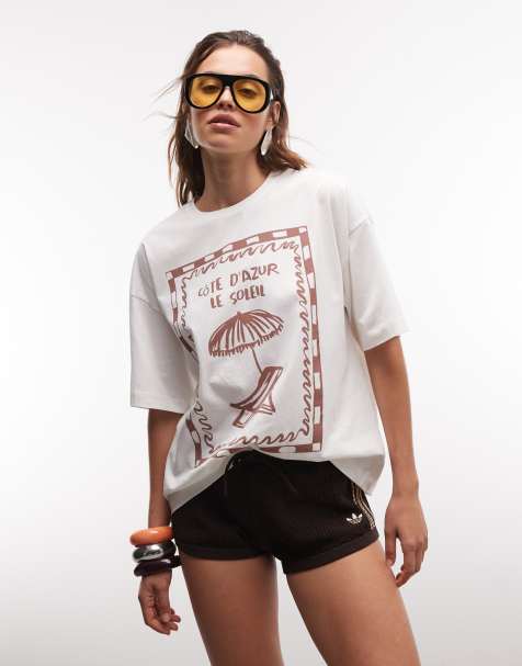 The Frolic Exclusive – Kremowy T-shirt oversize z nadrukiem z motywem leżaka na piersi - view 1