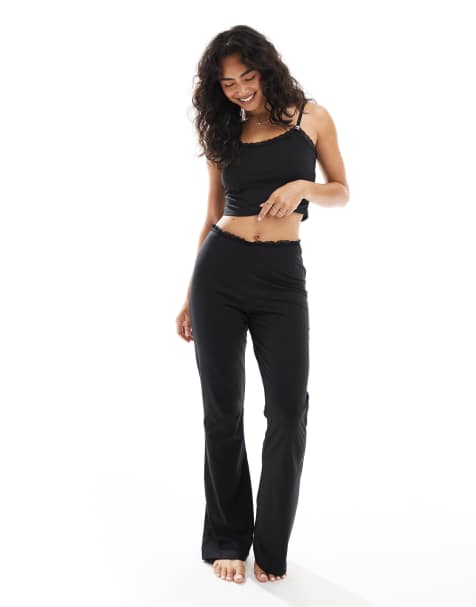 The Frolic exclusive lace trim jersey slim flare pyjama pants in black (Part of a set) - view 1