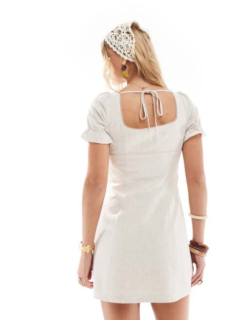 The Frolic exclusive linen blend square neck lace trim tie back puff sleeve mini dress in stone  