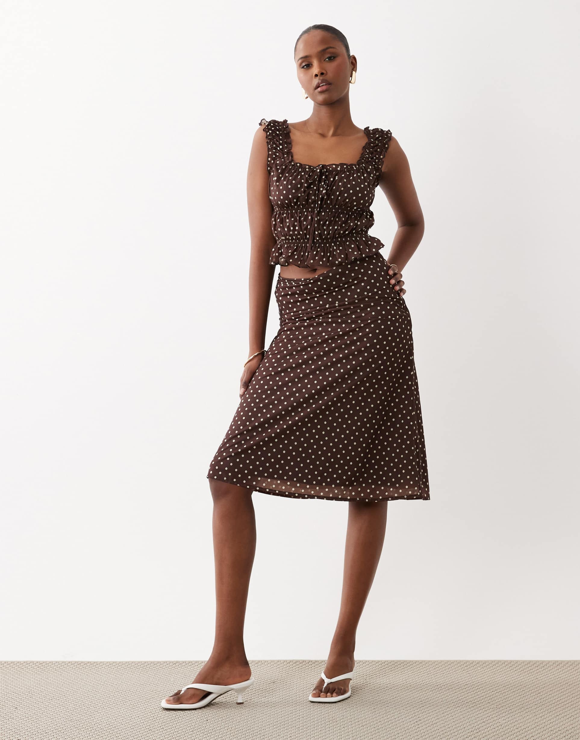 the frolic exclusive low waist midi skirt in chocolate polka dots - part of a set