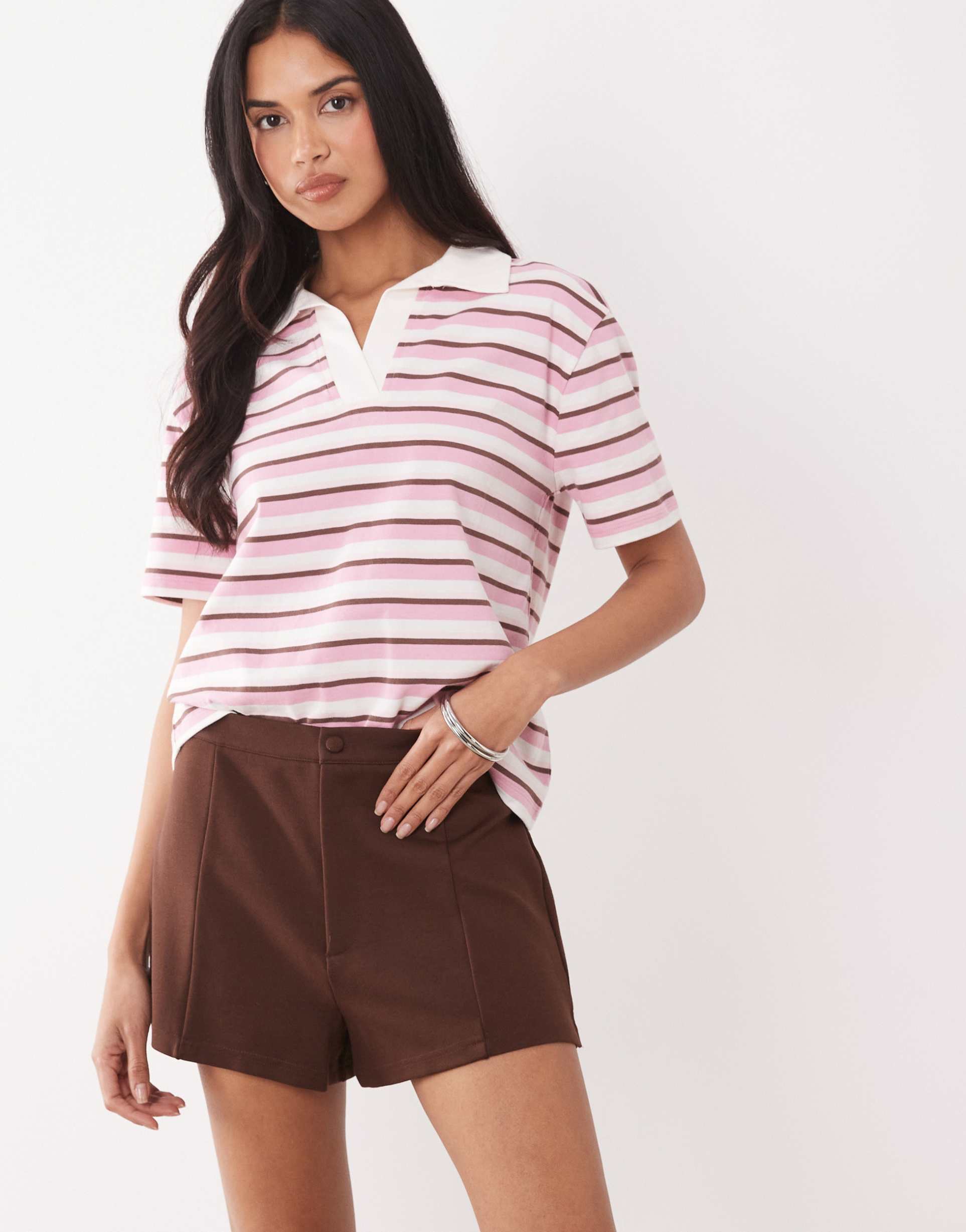 the frolic exclusive oversized short sleeve polo top in pink stripe