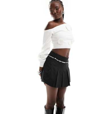 exclusive pleated contrast ruffle flower button detail mini skirt in black pinstripe-Multi