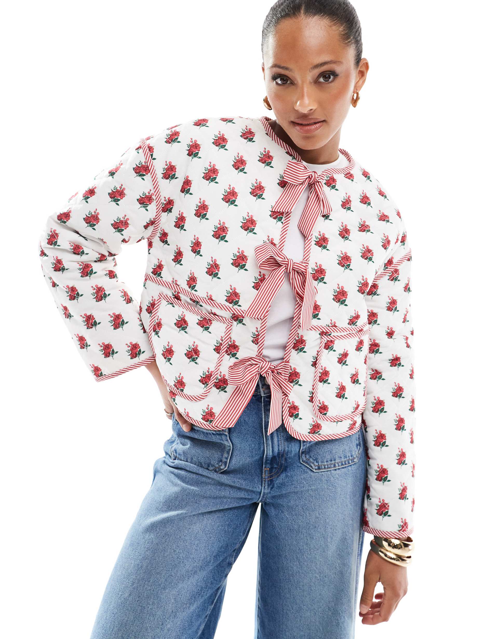 the frolic exclusive quilted bow tie front reversible jacket in cream floral and red stripe