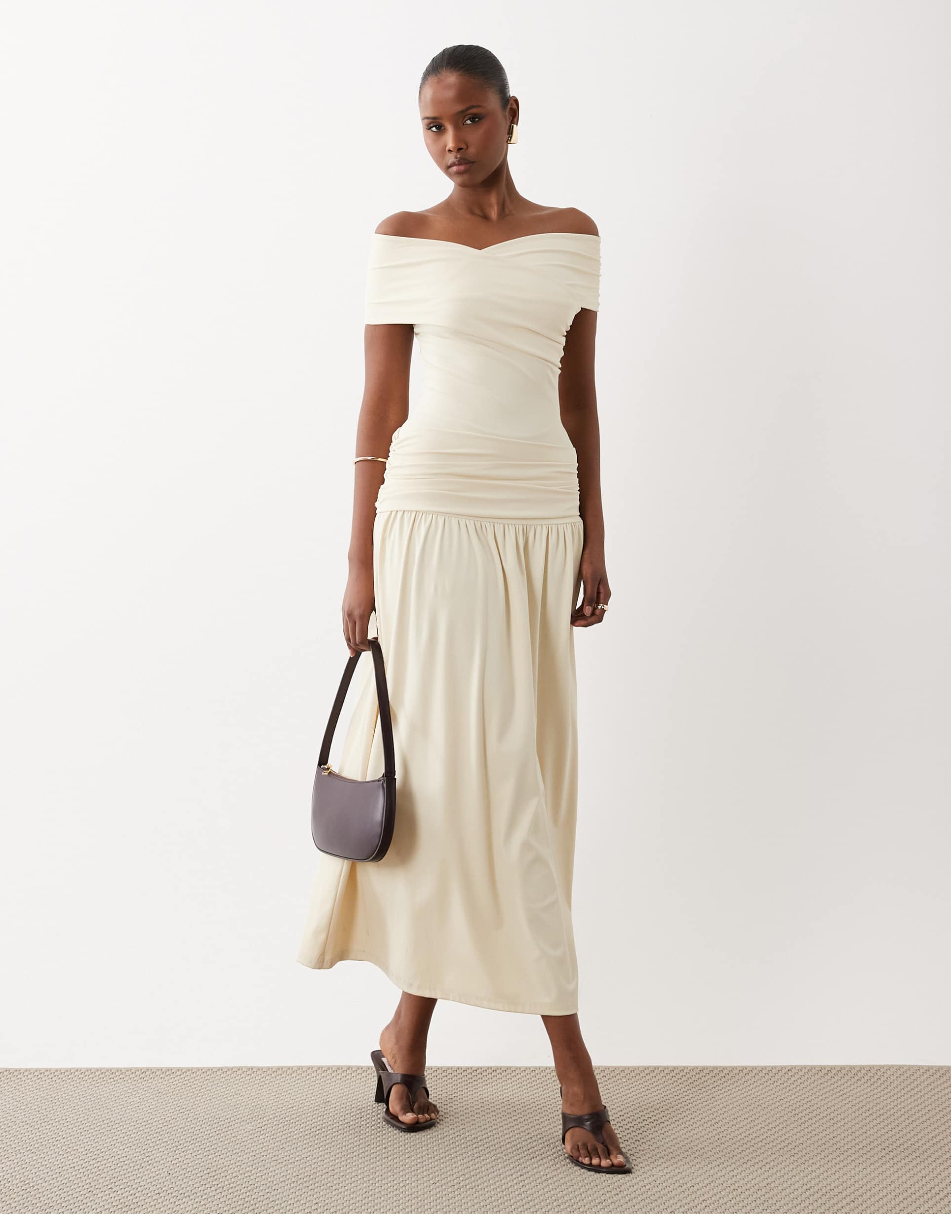 the frolic exclusive slinky wrap asymmetric ruched detailing dropped waist maxi dress in yellow