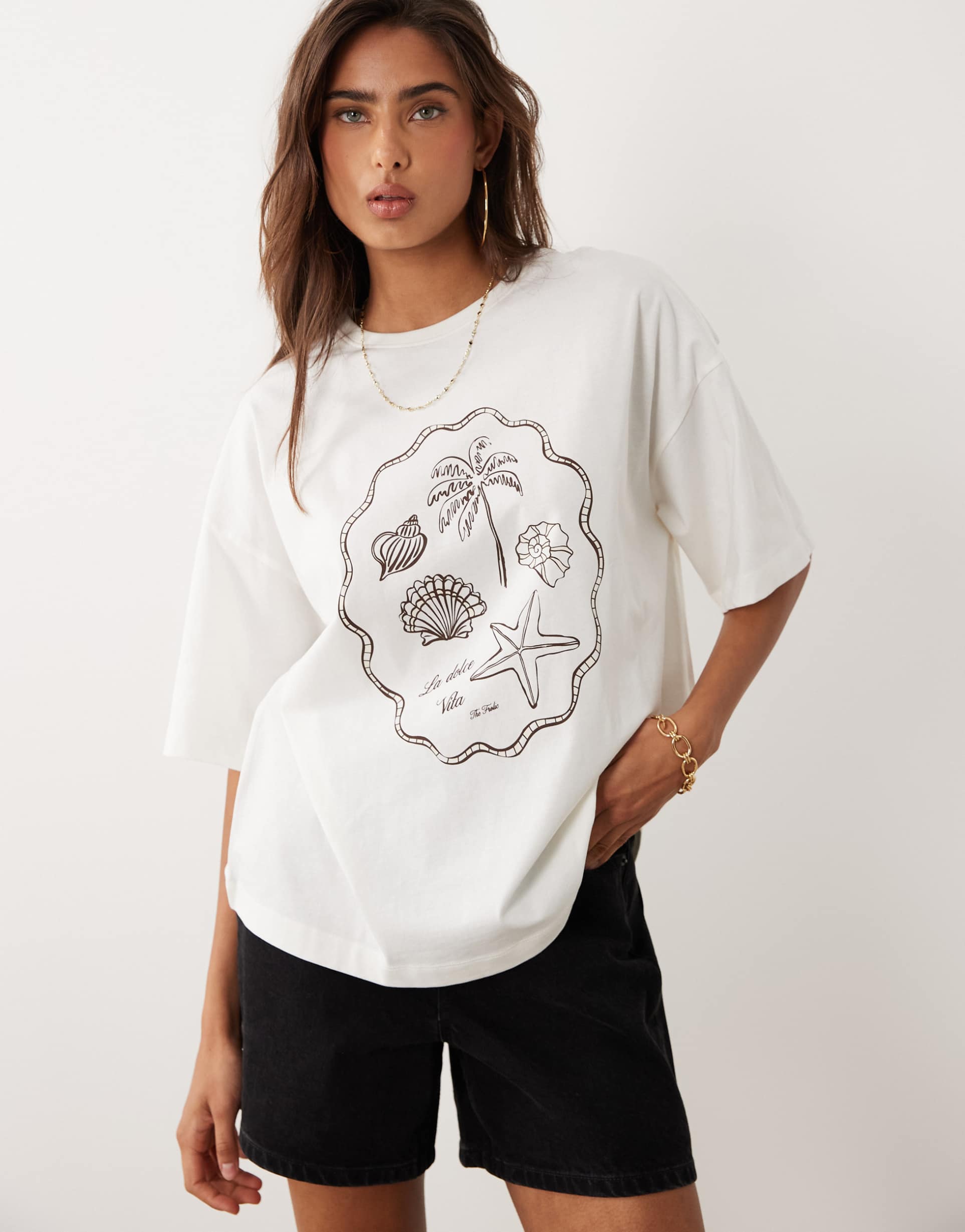 the frolic exclusive summer beach graphic front oversized t-shirt in cream