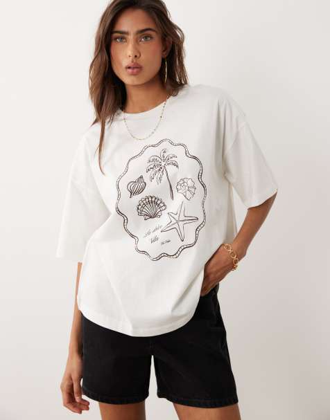 The Frolic – Exklusiv – Oversize-T-Shirt in Cremeweiß mit sommerlichem Strand-Print auf der Vorderseite - view 1