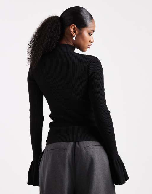 The Frolic – Exklusiver, gerippter Strickpullover in Schwarz mit Perlendetail und ausgestellten Ärmeln, 3 von 4