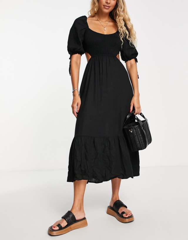 The Frolic Fin linen shirred front puff sleeve midi dress in black