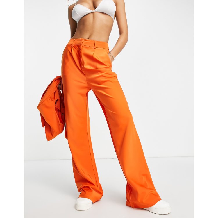 The Frolic flared tailored pants in orange satin - part of a set