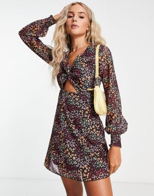 The Frolic flippy mini tea dress with mesh sleeves and twist front in ditsy floral