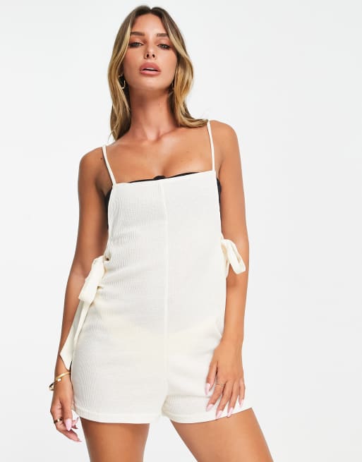 The Frolic Flora beach romper with tie detail in cream waffle