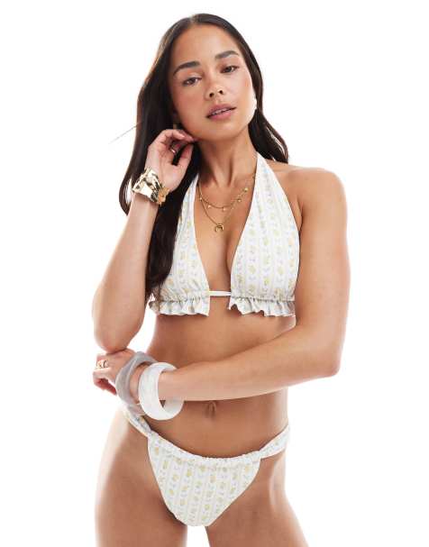 The Frolic – Gul, blommig bikiniöverdel i trekantsmodell med halterneck och volang, del av set, exklusivt hos ASOS - view 1