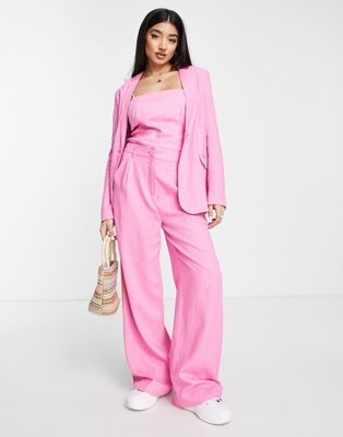 The Frolic linen oversized suit trousers in bright pink