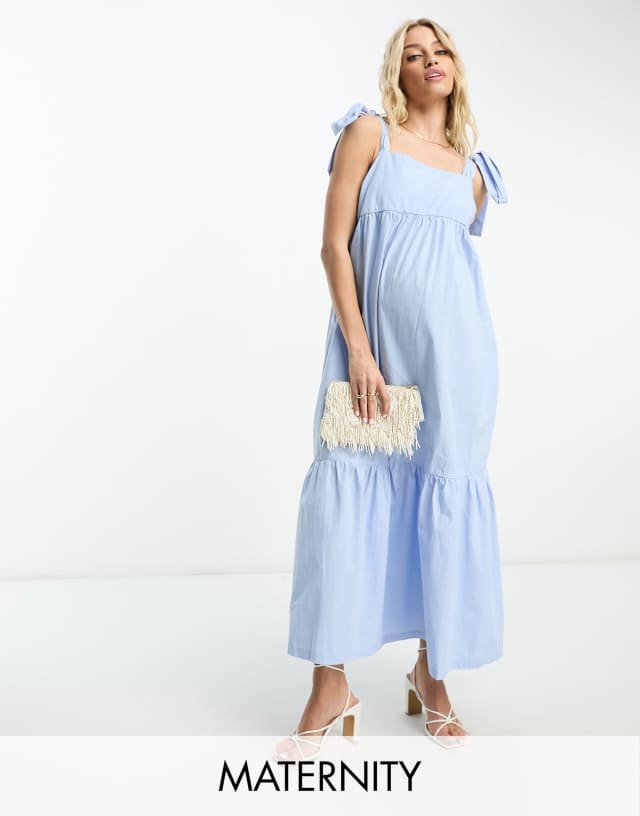 The Frolic Maternity tiered midi dress with tie straps in blue poplin