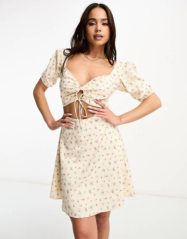The Frolic milkmaid mini dress with cut out bodice in vintage floral