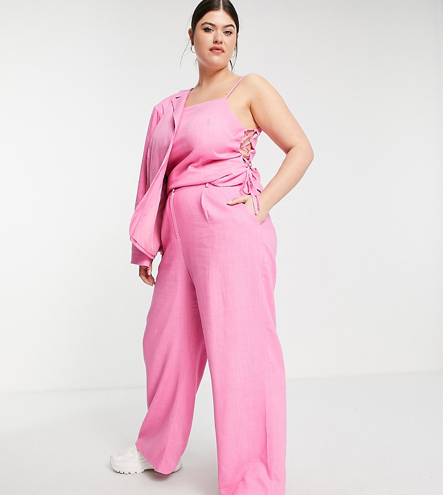 The Frolic Plus linen oversized suit pants in bright pink