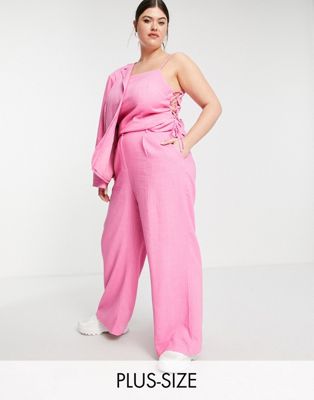 The Frolic Plus linen oversized suit trousers in bright pink