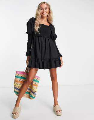 The Frolic Plus shirred bust & sleeve mini smock dress in black | ASOS