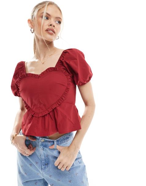 The Frolic exclusive puff sleeve ruffle heart detail peplum crop top co-ord in red    