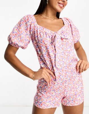 The Frolic Spectrolite Delicate Floral Puff Sleeve Summer Romper In Pink