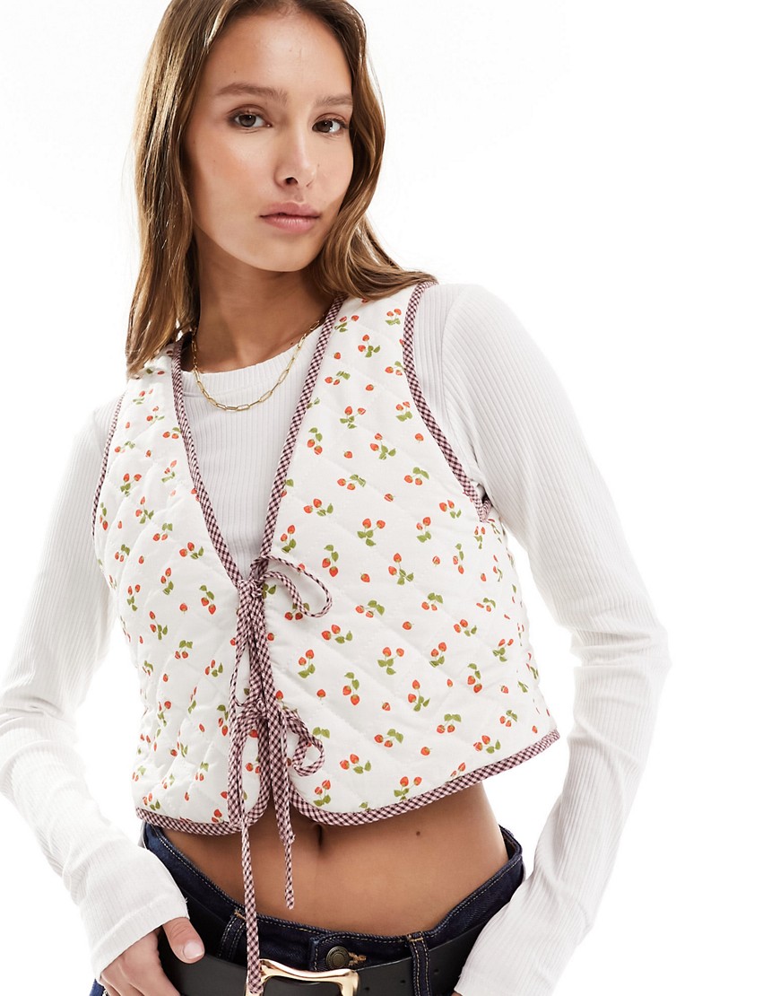 The Frolic strawberry print reversible quilted gilet in multi