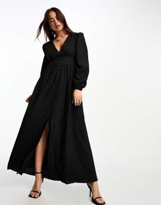 The Frolic Textured Plunge Neck Maxi Dress In Black