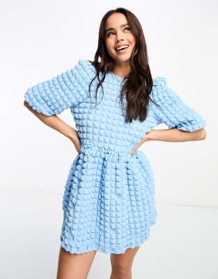 The Frolic Textured Tie Back Bubble Mini Dress In Blue
