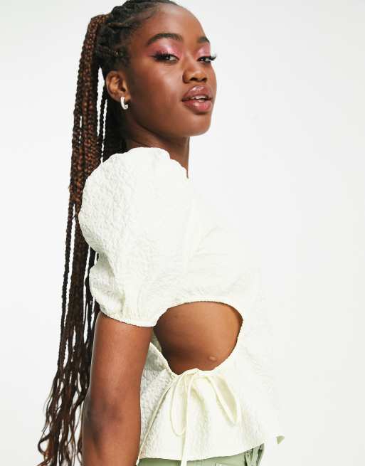 The Frolic - Top con maniche a sbuffo e cut-out laterali in jacquard bianco sporco