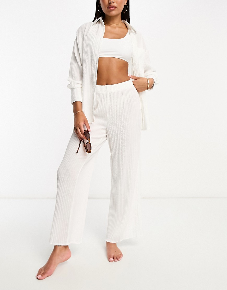The Frolic tourmaline shirred wide long trouser co-ord in white pleated texture
