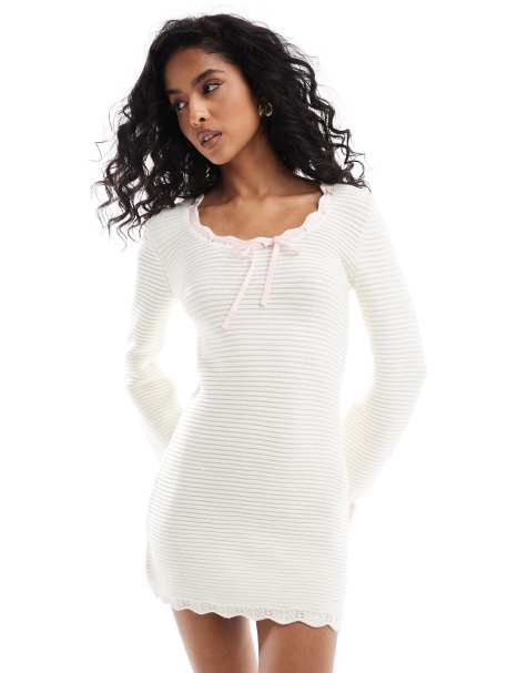 The Frolic x Bella Stovey exclusive knitted scallop hem ribbon detail mini jumper dress in cream - view 1